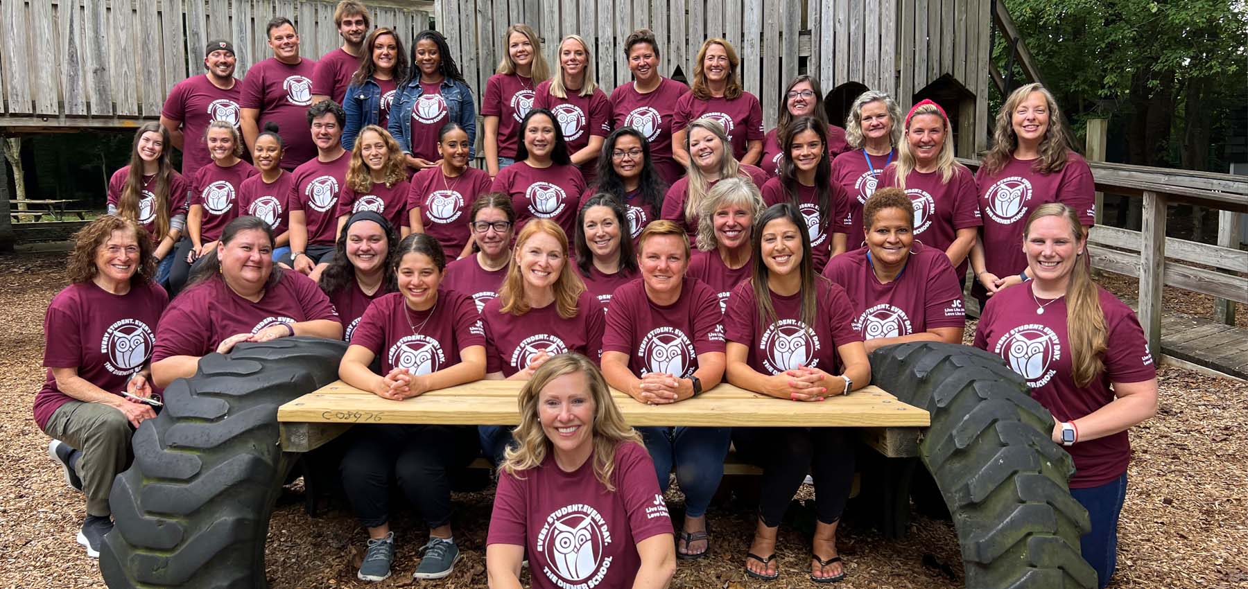 The Diener School Staff Group Photo on Playground